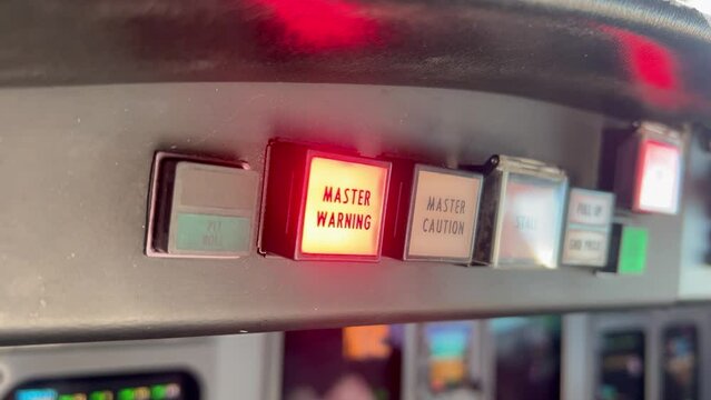 Airplane&rsquo;s cockpit emergency  warning lights flashing  due to fire inside a modern jet.