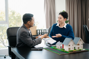 Customers who choose to buy a condominium room and a bank approve a loan for their purchase. Condominium and house loan interest rate from bank concept.