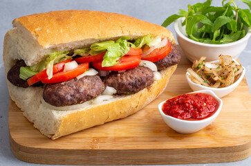 Delicious Turkish Meatballs Sandwich, Kofte Ekmek. Turkish name; kofte ekmek or ekmek arasi kofte