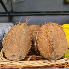 A couple of loaves of bread on a wooden surface