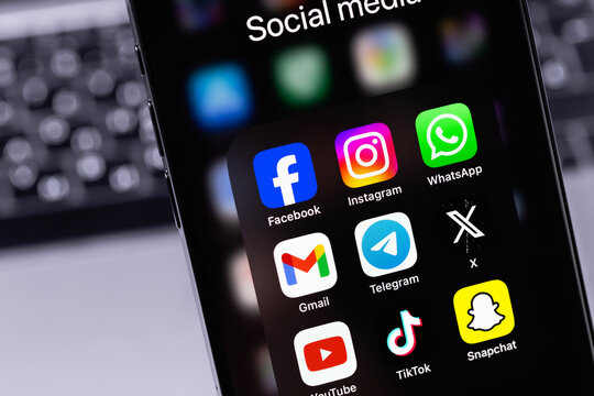 showing social media mobile apps (Facebook, Instagram, WhatsApp, Gmail, Telegram, Twitter X, YouTube, TikTok, Snapchat) on a screen interface smartphone iPhone. Batumi, Georgia - November 4, 2023