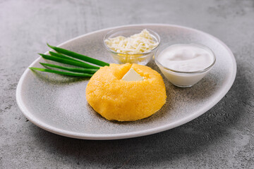 polenta with onions, feta cheese and sour cream