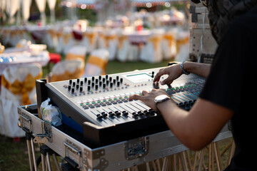Audio sound mixer and amplifier equipment in outdoor party