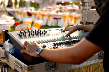 Audio sound mixer and amplifier equipment in outdoor party