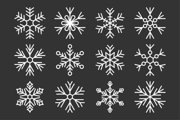 Set of white snowflakes on a black background