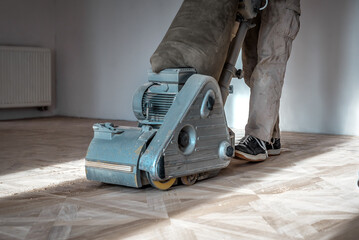 Professional grinding machine for parquet wooden floor renovation - obrazy, fototapety, plakaty