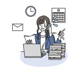 仕事に追われる女性社員