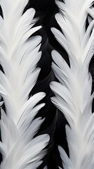 A symmetrical arrangement of sleek black and metallic feathers forming a stylish and modern pattern on a white surface.	Vertical. 