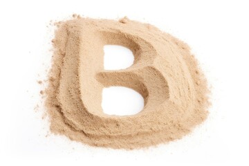 letter b, from sand, on white background