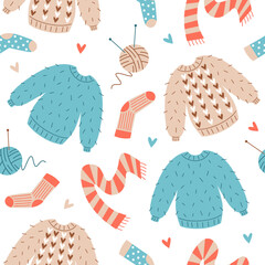 Seamless pattern with various warm knitted clothes elements and balls of wool. Sweater, scarf, sock. Knitting, fashion or clothing theme background in pastel colours. Vector illustration.