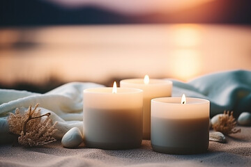 Obraz na płótnie Canvas Closeup of white candles for spa treatment background.