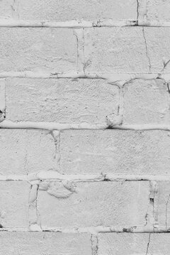 Old brickwork silicate blocks wall white light grey paint texture background