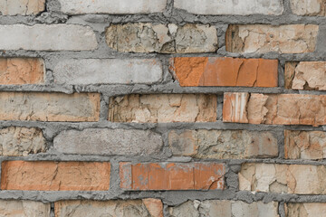 Old brickwork wall with cement interlayer texture rough background brick