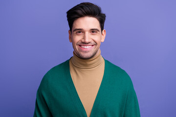 Fototapeta premium Photo of positive nice good mood man dressed green clothes isolated on purple color background