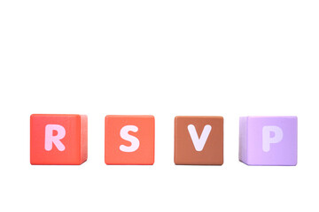 The word RSVP is made with colorful building blocks isolated on a white
