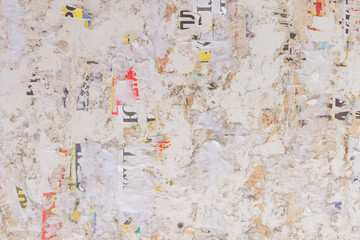 Fototapeta premium Old dirty tattered torn paper bulletin board texture background
