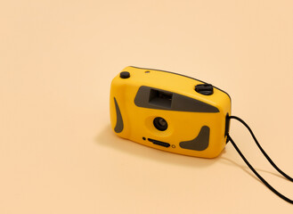 Retro yellow camera. Copy space for text.
