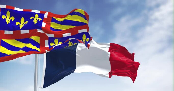 View of the Burgundy flag waving in the wind on a clear day