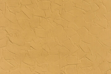 Yellow bright light vibrant paint abstract pattern plaster surface stucco wall texture background structure backdrop