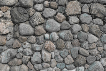 Stones cobblestones cement wall solid texture background rough street rock surface grey
