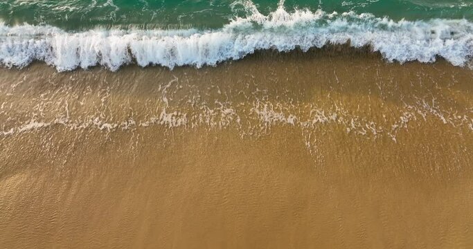 Overhead View of Emerald Sea Ebb and Flow on Golden Sands