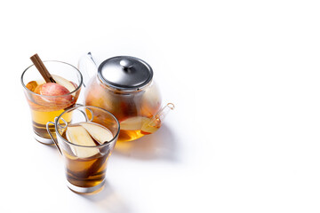 Autumn hot apple drink with spices isolated on white background