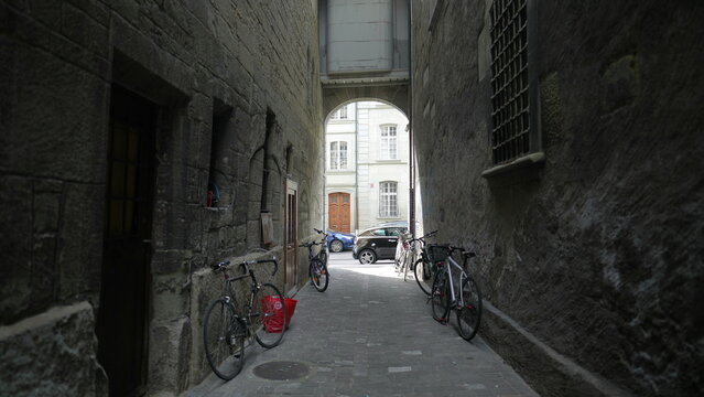 ancient back alley in Swiss city with bicycles at rest © Marco