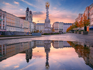 Linz, Austria. Cityscape image of main square of Linz, Austria with reflection of the city skyline at beautiful sunrise.