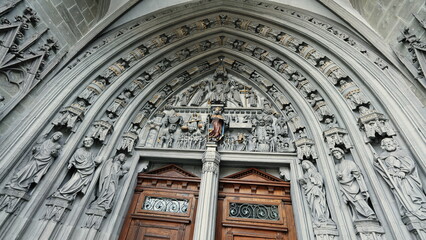 Fribourg, Switzerland Circa March 2022 - Religious Temple entrace, exiting Church and seeting...