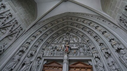 Fribourg, Switzerland Circa March 2022 - Entrance of Saint Nicholas Catholic Church with Religious...
