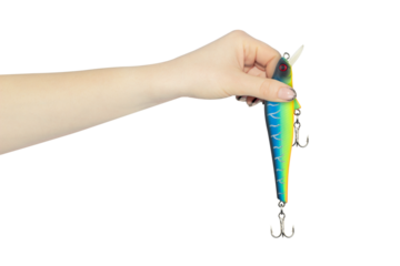 fishing bait in outstretched hand isolated from background