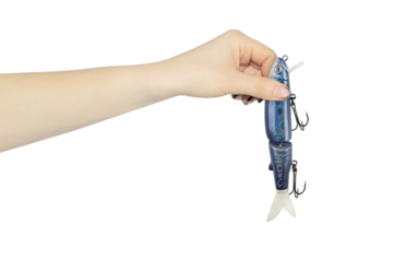 fishing bait in outstretched hand isolated from background