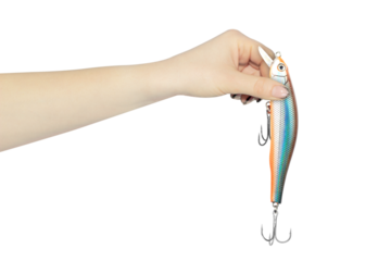 fishing bait in outstretched hand isolated from background