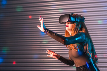 Side view of a woman using VR goggles