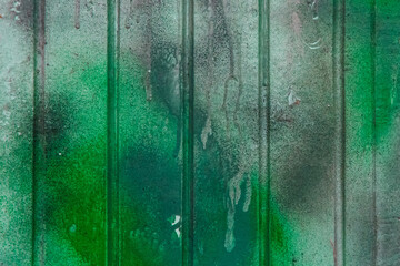 Green paint spot stain old dirty fence surface weathered texture background