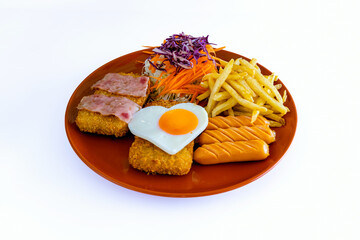 Steak fried fish with bacon, fried egg, sausage, french fries and salad on dish with white background. Meat steak and french fries serving plate fast food meal.Steak meal set with trimmings. Food Menu
