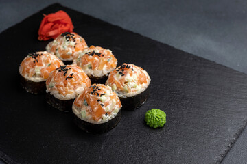 Japanese cuisine. Delicious rolls with salmon