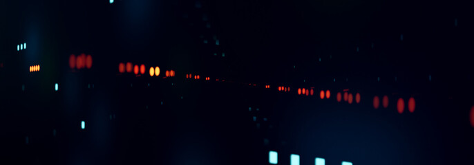 Orange, blue and red dots, blurred light effect. Illuminated background with abstarct reflections. Futuristic, design, light pattern.