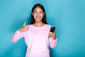 Portrait of cute elegant blackhead girl showing thumbs up, A pretty young girl giving thump sing in happiness as a sign of approval or yes isolated, Young happy woman holding thumbs up isolated.