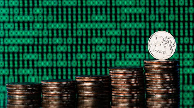 Conceptual story about digital ruble - coin with Russian ruble symbol and binary code - Powered by Adobe
