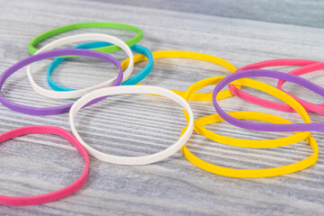Rubber bands or erasers. Development of kids motor skills, coordination logical thinking