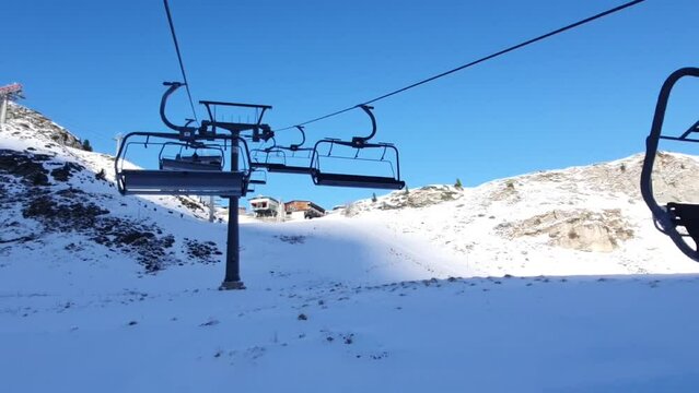 Ride on a chairlift in European Alps. Hintertux glacier in autumn. 