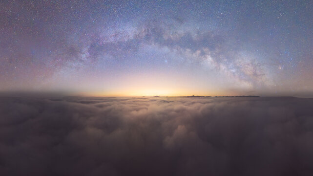 Milky Way Arc over Sea of Clouds at Sunset