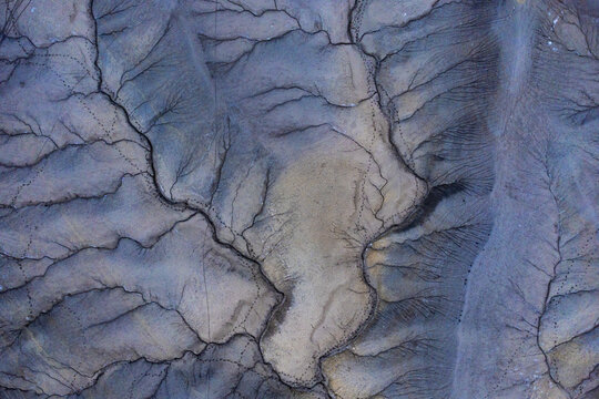 Abstract blue rock texture resembling flowing water