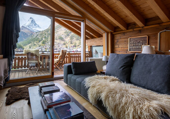Cozy cabin interior with stunning mountain view