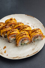 Japanese cuisine. Delicious Rolls with salmon and cheese
