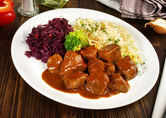 Beef Goulash with Noodles and red Cabbage