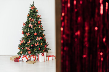Interior christmas tree with gifts toys decorated new year