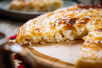 Traditional Bosnian and Turkish meal made from rolled pastry filled with spinach. In Turkey it is called Borek with cheese. In Bosnia this dish is called Pita Sirnica. Made from phyllo pastry.