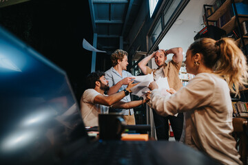Business partners discussing project details over coffee. Executives strategizing for successful teamwork in a casual cafe. Colleagues networking for opportunities in the evening.